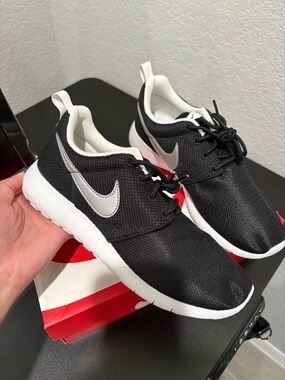 Nike Kids Black Sneakers with White Sole and Silver Swoosh